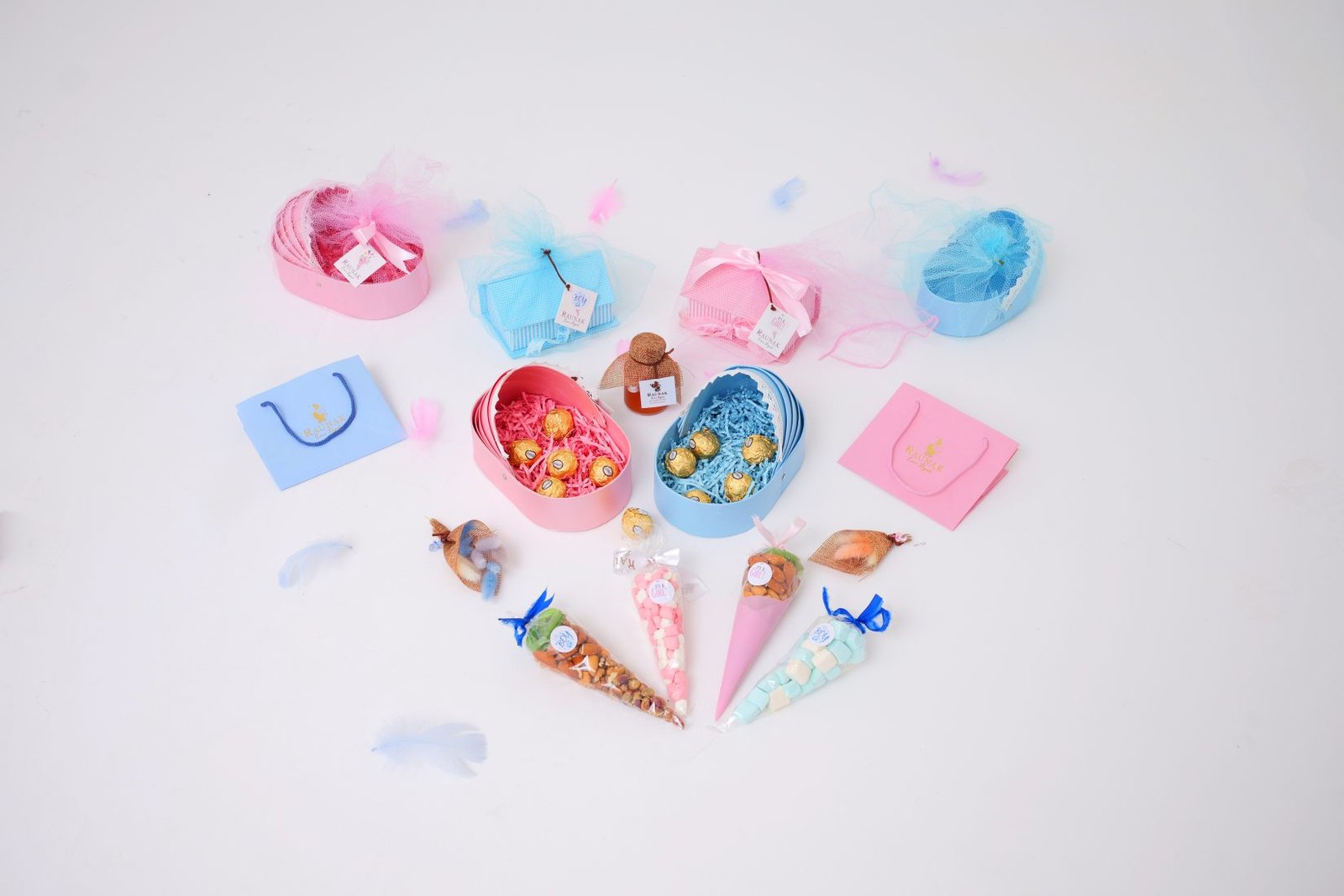 Pastel baby gifts, keepsake boxes and treat cones